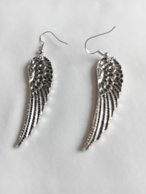 Silver coloured angel wings earrings