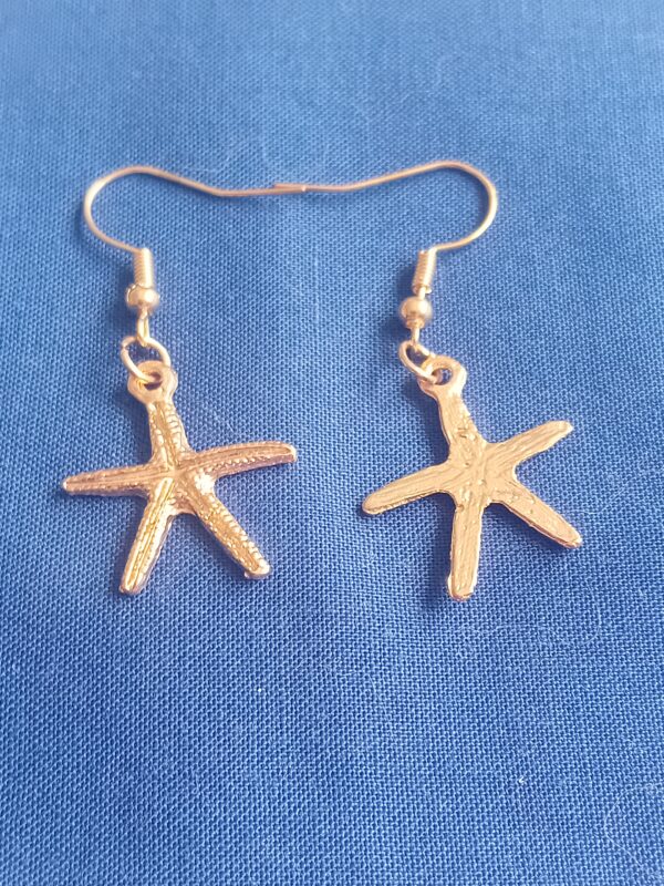 Delicate gold coloured starfish earrings