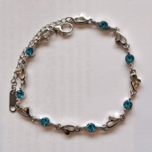 Silver Coloured Bracelet with Bright Blue Circular Decoration | Stylish Modern Jewellery