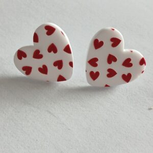 Sweet white heart stud earrings decorated with little red hearts