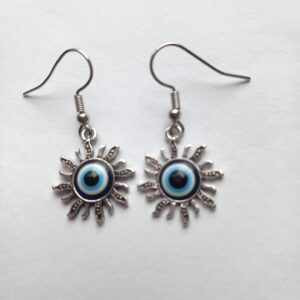 Lovely silver coloured Sun design earrings with blue eye