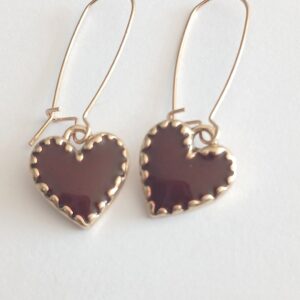 Dark red hanging heart in gold coloured fitting earrings