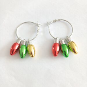 Festive red, green and gold Christmas light earrings on a silver hoop. Bright, lightweight holiday jewellery perfect for parties, gifting and seasonal outfits